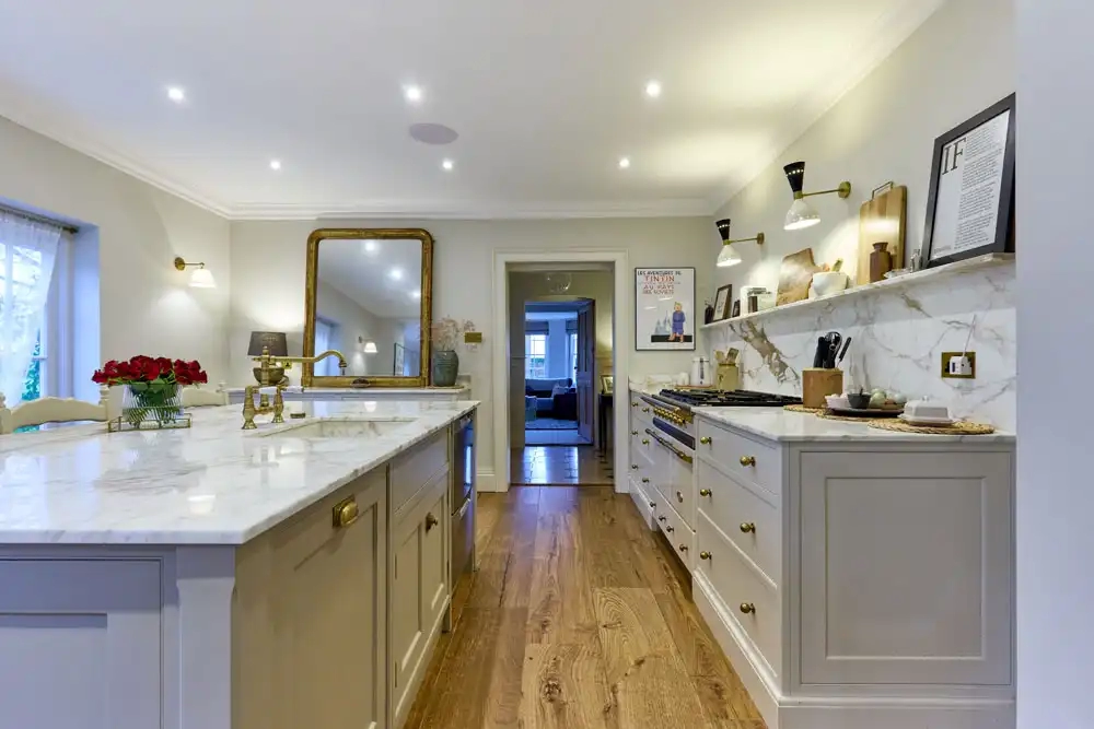 Traditional Style Kitchen With Marble Counters and Splashbacks